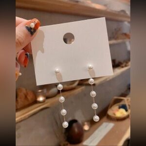 Gold and pearl dangle earring formal